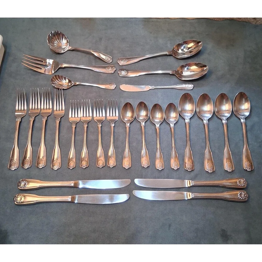 International Silver Coquille Flatware Service for Four + 26 Pc